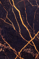 black marble with Golden lines, natural black marble texture. White and yellow patterned natural