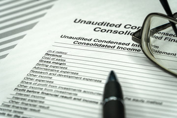 Obraz premium Financial statements review and analyze with tables. Business investment portfolio