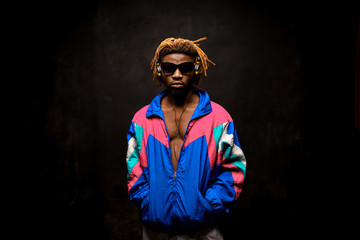 Afro american man in glasses with headphones