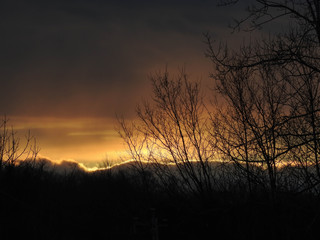Naklejka premium Sunset in the clouds