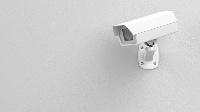 Surveillance camera on the wall