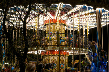 Carousel lighted on the night of the city