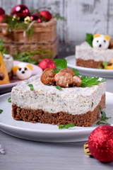 Salty cheesecake garnished with roasted champignons. New Year 2020 appetizer with mice of quail eggs, symbol of the new year