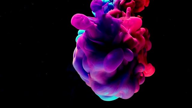 Beautiful red-blue-violet space abstract background. Stylish modern background. Cool trending screensaver. Watercolor ink in water on a black background. A powerful explosion of colors.