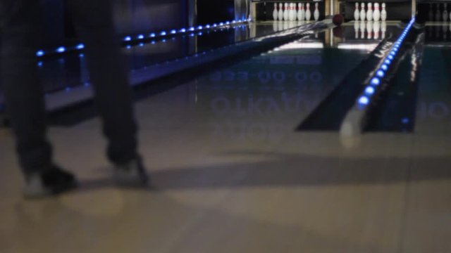 a game of bowling. the player misses. failure.loss .loser.disappointment