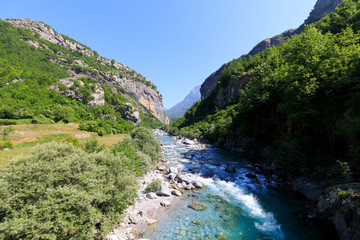 Fototapeta na wymiar Mountainous landscape with green forests and clear rivers in the northern Dinaric Alps in Albania