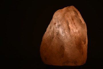 Himalaya Salt Lamp in the House Glowing in the Dark