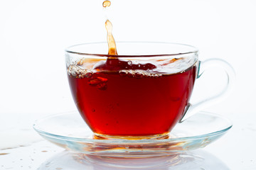 Cup of tea on white background