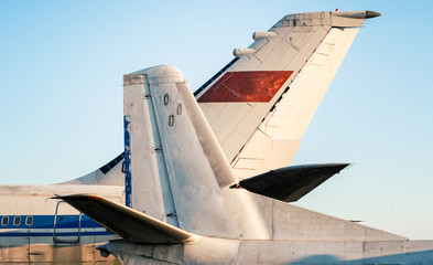 tail and wings of large old airliners with the symbol of the Soviet Union
