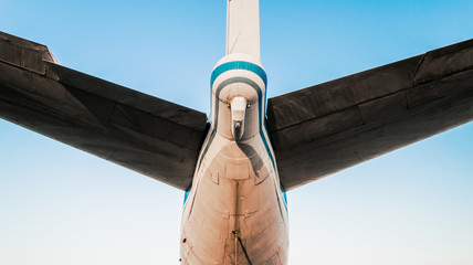 tail and wings of a large old airliner