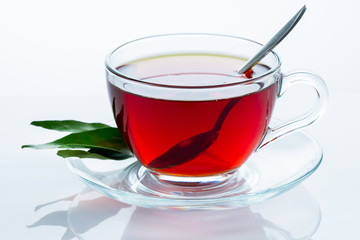 Cup of tea on white background