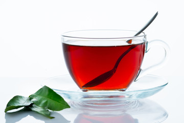 Cup of tea on white background