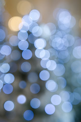 Light blue bokeh On a soft orange background Shot with lens blur Used as an illustration