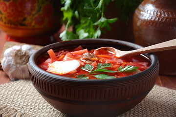 Traditional Ukrainian Russian borscht . Bowl of red beet root soup borsch with white cream . Beet Root delicious soup . Traditional Ukrain food cuisine 