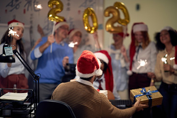 Business team celebrating new 2020 year in office