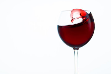 glass of red wine on white background