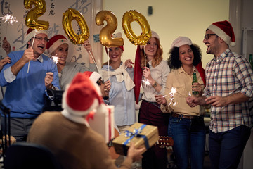 Business team celebrating new 2020 year in office