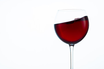 glass of red wine on white background