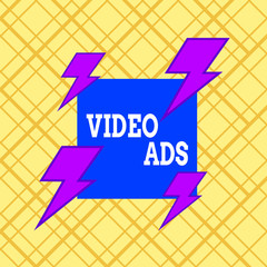 Writing note showing Video Ads. Business concept for Engage audience in the form of video content advertising Asymmetrical format pattern object outline multicolor design