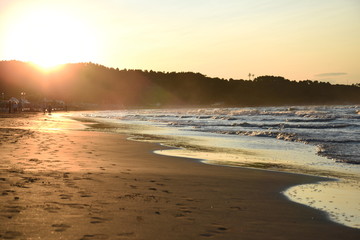 Fototapeta na wymiar Beautiful Beach Sea and Sand at Sunset