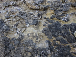 Salt crystals on limestone rocks near Mediterranean sea   