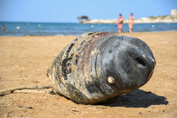 Old Bouy on the Sand in the Beach