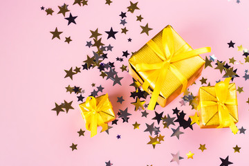 Golden gift boxes and confetti