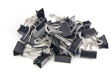 small number of metal clips in black and white