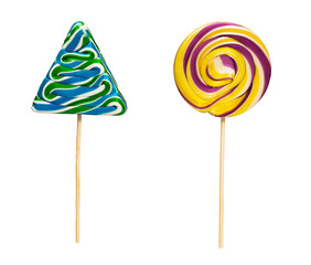 sweet sugar caramel lollipops isolated white background shape of Christmas trees and the sun