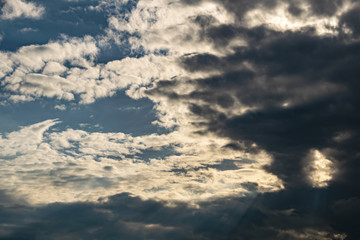 gray Cumulus clouds in a blue sky