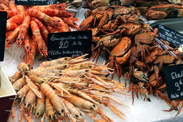 Various seafood at fish market in Le Treport, France. Crabs and shrimps.