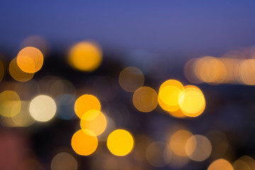 Blurred bokeh city lights, abstract night scene. High resolution full frame background.