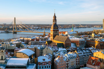 Fototapeta premium Panorama view from Riga cathedral on old town of Riga, Latvia. Aerial view on Riga city centre in sunny winter day.