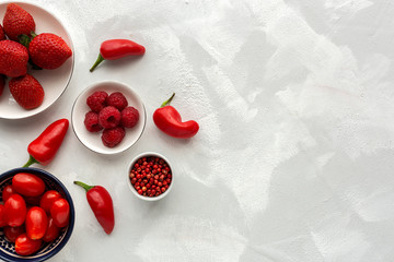Assortment of red fruits and vegetables from above