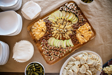 Charcuterie Board featuring fresh figs, nuts, apples and cheese