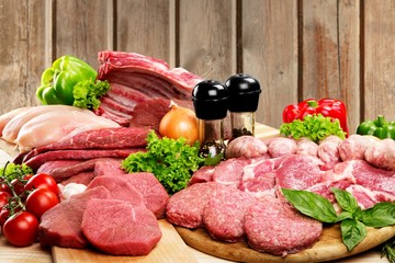 Fresh Raw Meat Background with vegetables