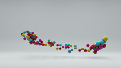 3D illustration of many colored balls of different sizes on a white background. Vitamins in space, a burst of laughter and energy. Abstract composition, 3D rendering