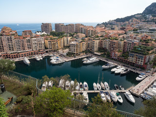Monaco, july 2019: Panoramic view of port. Azur coast. Colorful bay with a lot of luxury yachts in sunny day