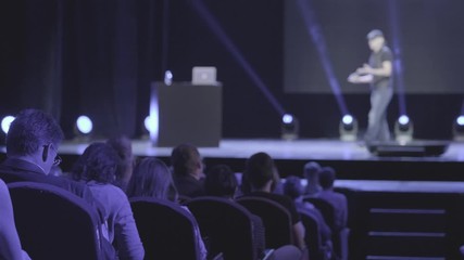 Audience listens lecturer at workshop