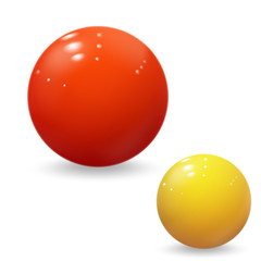 Realistic yellow and red balls isolated on white.