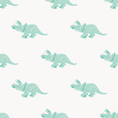 Turquoise dinosaur simple seamless pattern on pink.