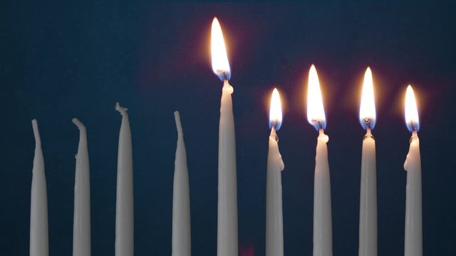 Video Of Four Lit Hanukkah Candles ON GRUNGE BACKGROUND And Shamash