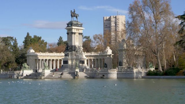 different views of autumn in the lake of the country house of madrid