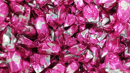 A heap of hungarian christmas sweetness fondant wrapped various colorful metal  papers