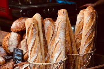 fresh baguette and country bread and barista 