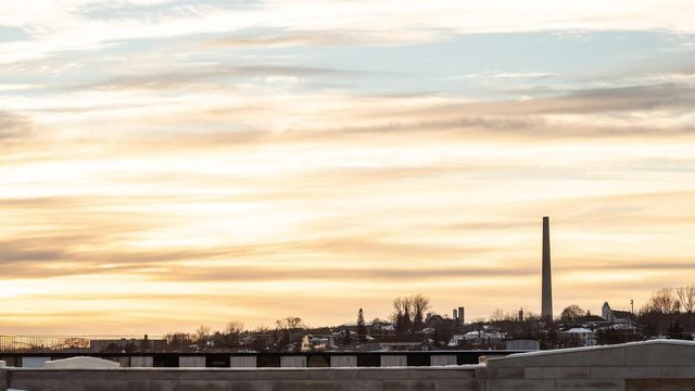 Timelapse of superstack mining chimney in Sudbury during a winter sunset