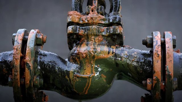 Water leaking from old rusty water supply pipe