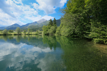 Breathtaking view of lake Crnava and Karavanke mountains in Preddvor, Slovenia