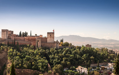 Fototapeta premium Ancient arabic fortress of Alhambra with Comares Tower, Palacios Nazaries and Palace of Charles, Granada, Spain