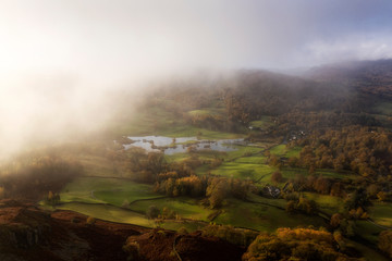Beautiful vibrant aerial drone landscape image of sunrise in Autumn Fall over English countryside